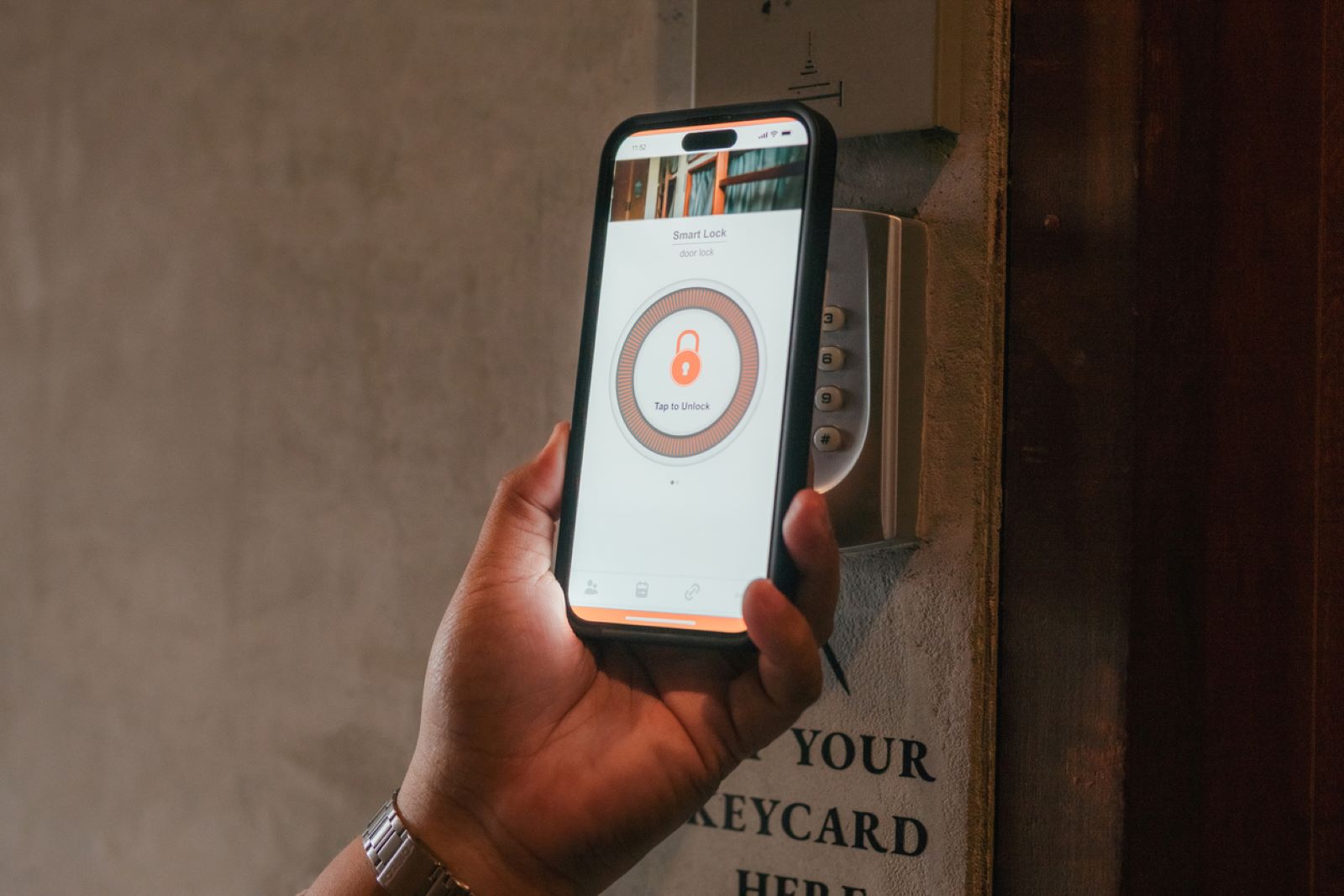 person opening high security lock with smartphone